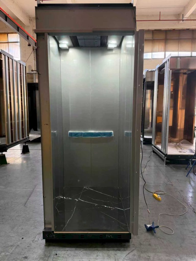 Stainless steel Nexco elevator cabin with handrail