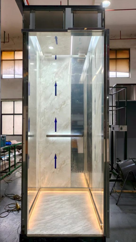 White marble Nexco elevator cabin with LED lighting