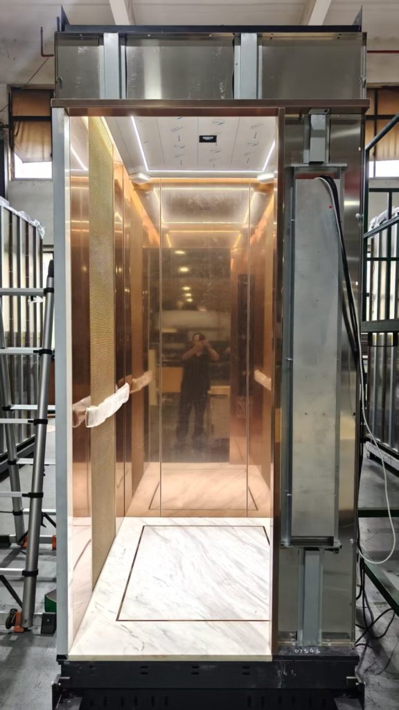 Wood and mirror finish Nexco elevator cabin